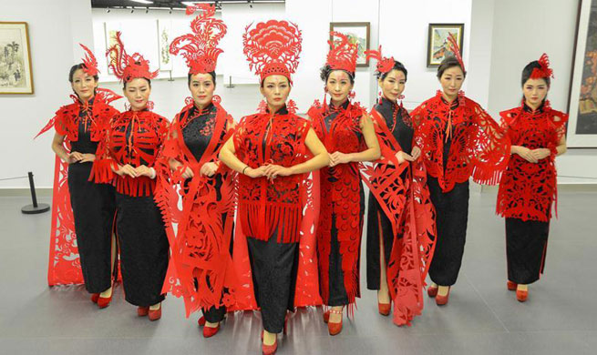 Paper cutting ornaments for qipao designed to greet Chinese lunar New Year