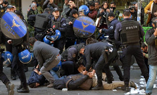 Policemen clash with protestors during protest rally in Turkey