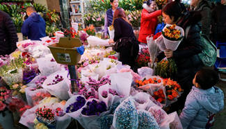 Customers shop at flower market in Beijing