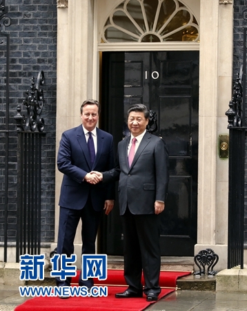 10月21日，国家主席习近平在伦敦唐宁街首相府同英国首相卡梅伦举行会谈。 新华社记者 鞠鹏 摄 