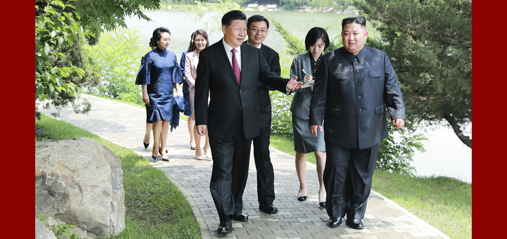 习近平会见朝鲜劳动党委员长、国务委员会委员长金正恩